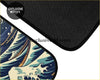 Black car floor mat with vibrant great wave off kanagawa design in blue and white for custom Hoshakuji mats