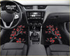 Black car floor mats with custom red cherry blossom branches and blossoms for a stylish ride interior