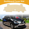 Beige dashboard cover mat for Toyota Aygo 2005-2014 with precise cutouts and a soft textured carpet surface
