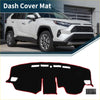 Dashboard cover mat for toyota rav4 2019-2024 in black with red trim and cutouts for dashboard controls