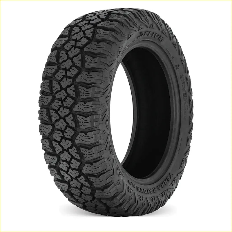 Black rubber delium terra raider at-x 285 50 r20 off-road tire with aggressive deep tread pattern and visible brand markings