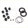 Black rubber and metal disc brake seal kit components for toyota hilux xtra cab 2005-2015 shown from back side