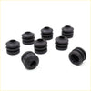 Black rubber cylindrical bushings with concentric ridges from disc brake seal kit for toyota hilux xtra cab 2005-2015