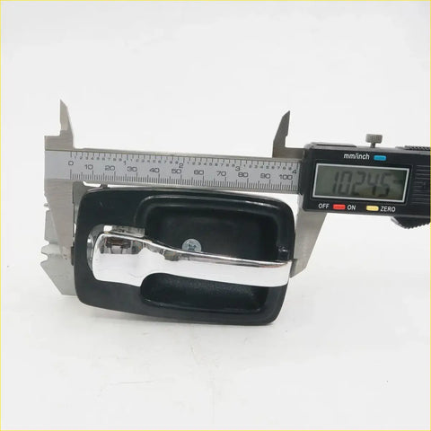 Black plastic door handle bezel with chrome metal pull for Nissan Datsun 620 ute 1972-1979