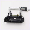 Black plastic door handle for Toyota Hilux Surf 1997-2005 showing back side with metallic spring and hardware components