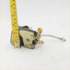 Gold-colored metal door lock actuator latch with black rubber padding and yellow screw caps for toyota hilux 1978-1983