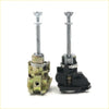 Two door lock cylinders for toyota hilux 2004-2015 with brass metal and black plastic housing shown from back side