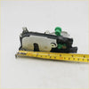 Back view of black and silver door lock latch with green plastic parts for toyota hilux 1997 to 2005 models