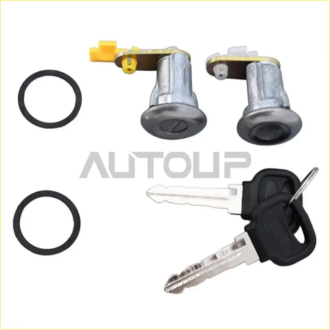 Pair of silver-colored car door lock cylinders with black rubber gaskets and keys for ford festiva mazda b2000 b2200 b2600 rx2