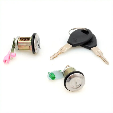 Two chrome door lock cylinders with matching black key blanks for nissan datsun sunny sentra nx1600 1990-1995
