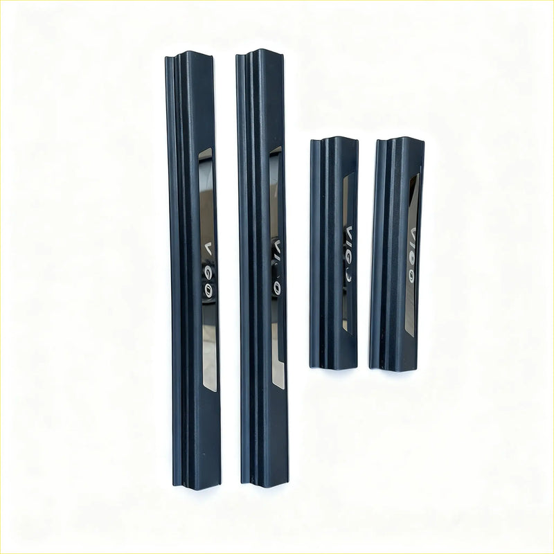 Set of four black matte door sill protectors with embossed vio branding for toyota hilux 2005-2015