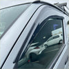 Black plastic door visor with textured surface and sleek curved design for toyota hiace monsoons weather shield