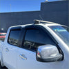 White pickup truck with black door visors made of weather shields and chrome side mirrors for ranger pj pk