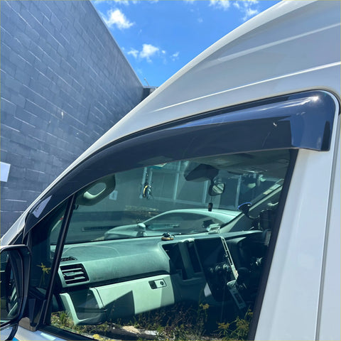 Black plastic door visors weather shields installed on white 2019+ toyota hiace window for weather protection