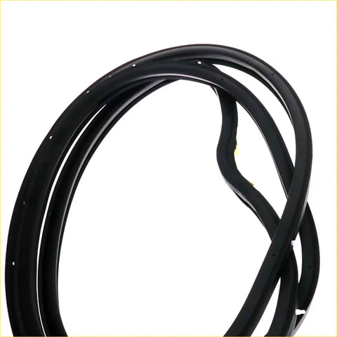Black rubber door weatherstrip seal with smooth glossy finish and small holes for Nissan Navara D21 Pathfinder WD21