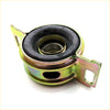 Yellowish metallic drive shaft center support bearing with black rubber bushing and central bearing for toyota hilux