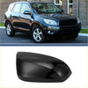 Black glossy plastic driver side mirror cover cap replacement for toyota rav4 2019-2023 shown from back side