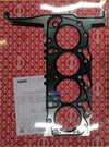 Black elring engine cylinder head gasket with circular cutouts and metallic edges for transit 4wd mk7-8 ranger td tdcitddi tdi