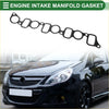 Black rubber engine intake manifold gasket with circular and rectangular cutouts for toyota hilux 2004