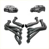 Black aftermarket 1 7/8 inch extractor and cat exhaust manifolds for holden commodore ve vf v8 shown from the back side