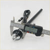 Black and chrome digital caliper measuring 36.91mm on fender antenna set component with black cable for Mazda B2000 1985-1988