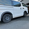 White nissan nv350 caravan with matte black sport style steel fender flares from 2012 to current model