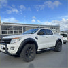 White ford ranger px1 2012-2015 with black fender flares and rugged off-road tires for a tough look