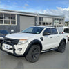 White ford ranger px1 2012-2015 with black fender flares and rugged off-road tires for tough styling