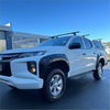 White mitsubishi triton with matte black bolt style fender flares and roof racks from 2019 to 2023 model