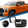 Black folding tow mirror assembly with integrated turn signal light for 2022-2023 toyota tundra side view