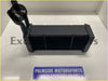 Black ford escort MK1 heater core with rectangular core and two cylindrical inlets made of durable metal or plastic