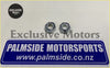Two chrome hexagonal nuts on a blue and white palmside motorsports sign for ford escort mk2 2.9 road car steering rack rhs