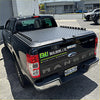 Black diamond plate ford ranger tomahawk aluminium hardlid truck bed cover with integrated rail system back view