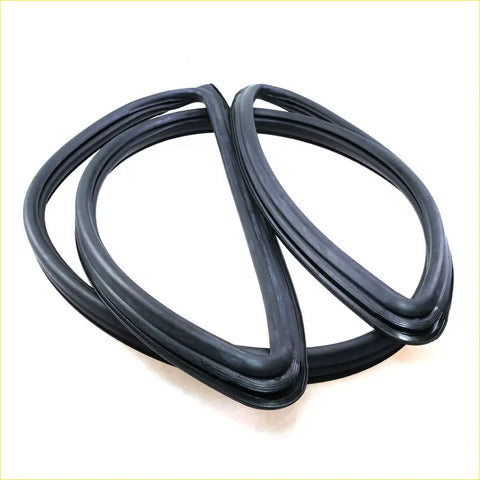 Black rubber windshield weatherstrip seal with molding for Nissan Patrol Safari shown from back side