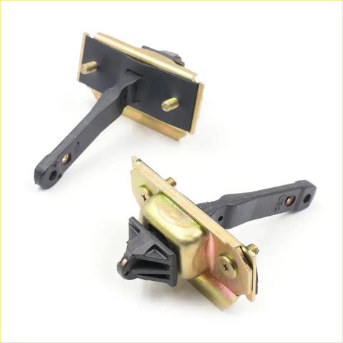 Front door strap stopper set for Mazda BT-50 double cab 2006-2011 in black and brass with metallic finish