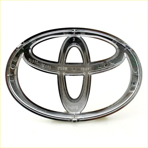 Chrome-finished front grill badge for toyota hilux vigo 2004-2012 featuring sleek oval design with three interlocking ovals