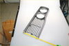 Chrome finished gray front grille set with two circular cutouts and horizontal slats for toyota hilux rn20 rn25 1972-1978
