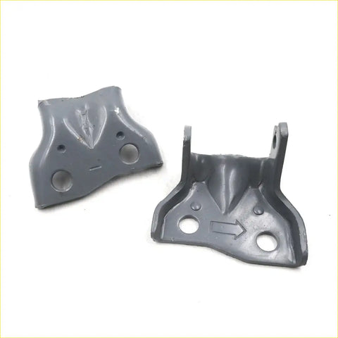 Gray plastic front left door hinge brackets with molded contours and circular holes for nissan navara d21 1986-1997