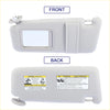 Light gray fabric front left passenger side sun visor for toyota venza with built-in mirror and warning labels