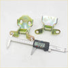 Two green painted metal front right door hinge brackets with a shiny finish for toyota hilux 1983-1991