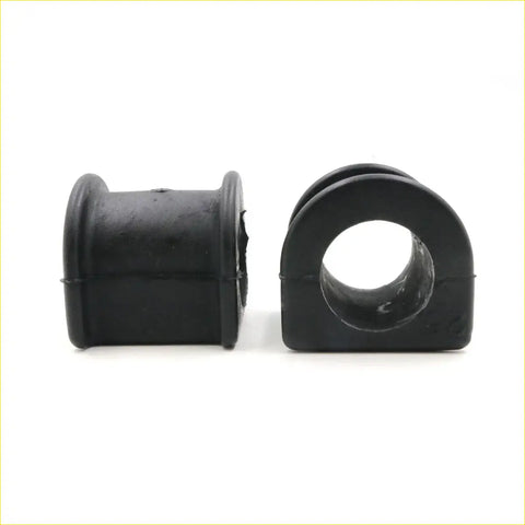 Black rubber front stabilizer bushing with cylindrical shape and open center for toyota hilux 1983-1997