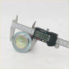 Front upper ball joint for toyota hilux 2004-2016 with metallic blue-green finish being measured by digital caliper
