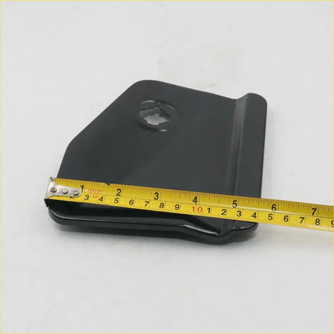 Black plastic seat belt anchor plate with central hole and molded edges for nissan datsun d21 fuel door cover