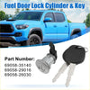 Black plastic head key with silver metal blades paired with metallic fuel door lock cylinder for toyota tacoma tundra