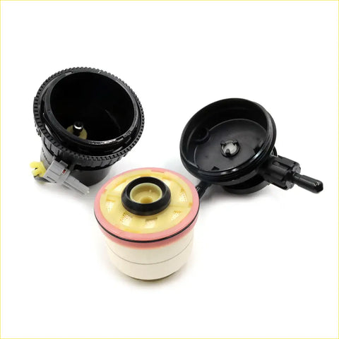 Black plastic fuel filter for Toyota Hilux SR5 2004-2016 with yellow and pink rubber seals