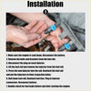 Hands holding blue plastic and metal fuel injectors for toyota tacoma 1995-1999 4 x engine injectors