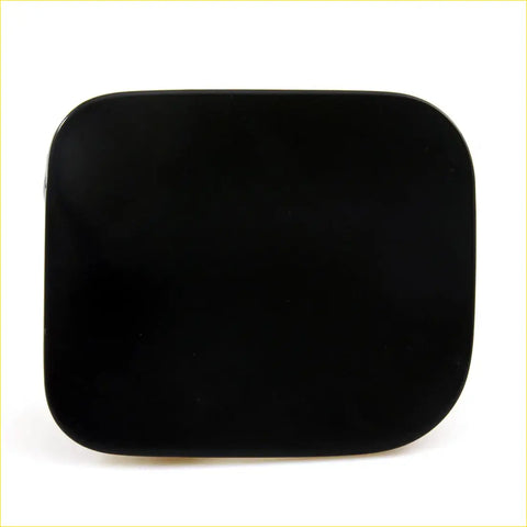 Black matte fuel lid cover lock hinge with rounded corners for Toyota Hilux 2004-2015 shown from back side