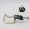A black digital caliper with silver metallic jaws measuring millimeters shown with a fuel sender gauge for toyota hilux 1979-1983