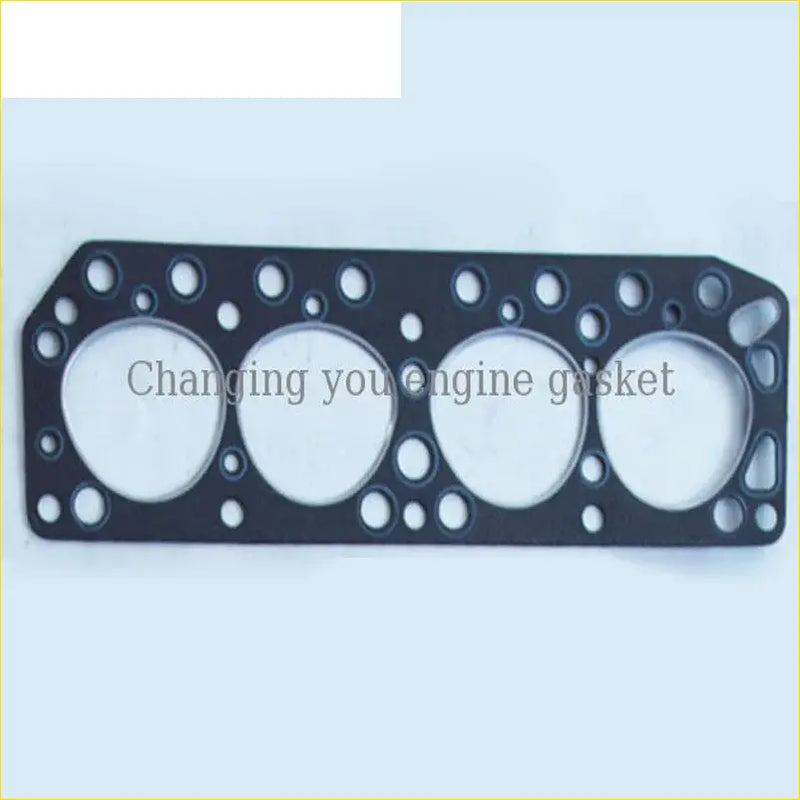 Black engine head gasket with four large openings and smaller holes for precise sealing in nissan hiace corolla hilux engines