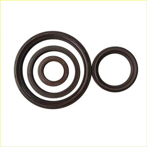 Set of four dark brown rubber crankshaft oil seals with textured edges for toyota land cruiser and hilux pickup